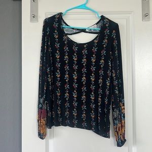 Open back lightly worn floral shirt